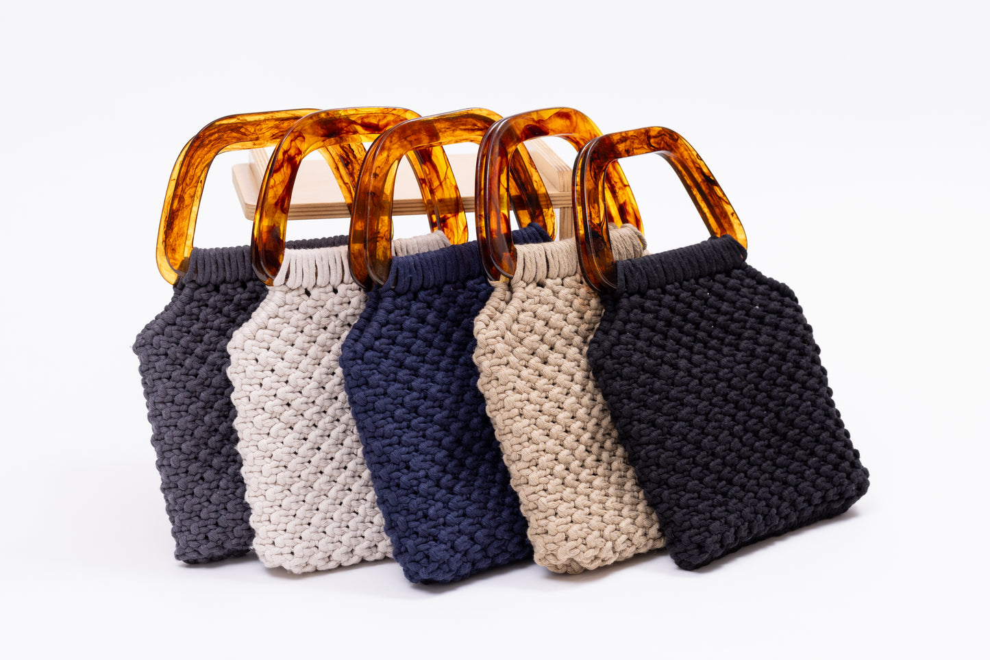 Top handle tortoise shell macrame purse